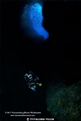 Inside the cave with scuba diver by Immacolata Moccia 